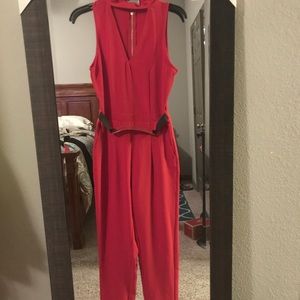Red jumpsuit with attached belt
